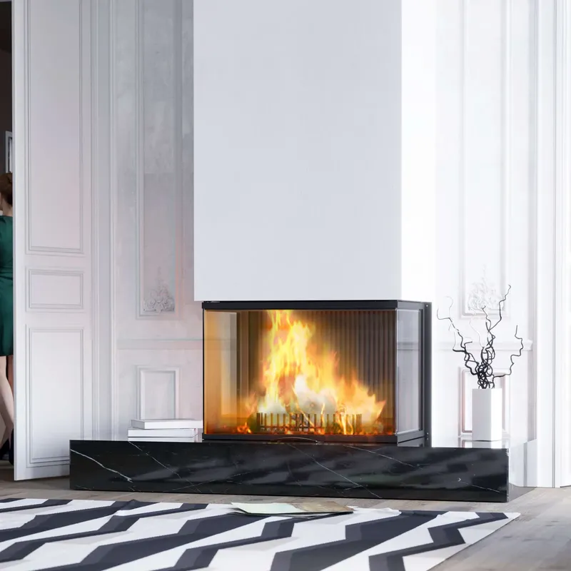 Foyer à bois Austroflamm Vuur Drie 80, installé dans une pièce