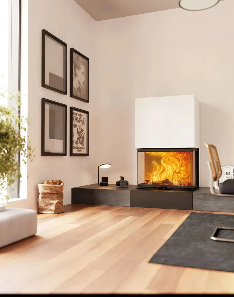 Foyer à bois Austroflamm Vuur Drie 80, installé dans une pièce